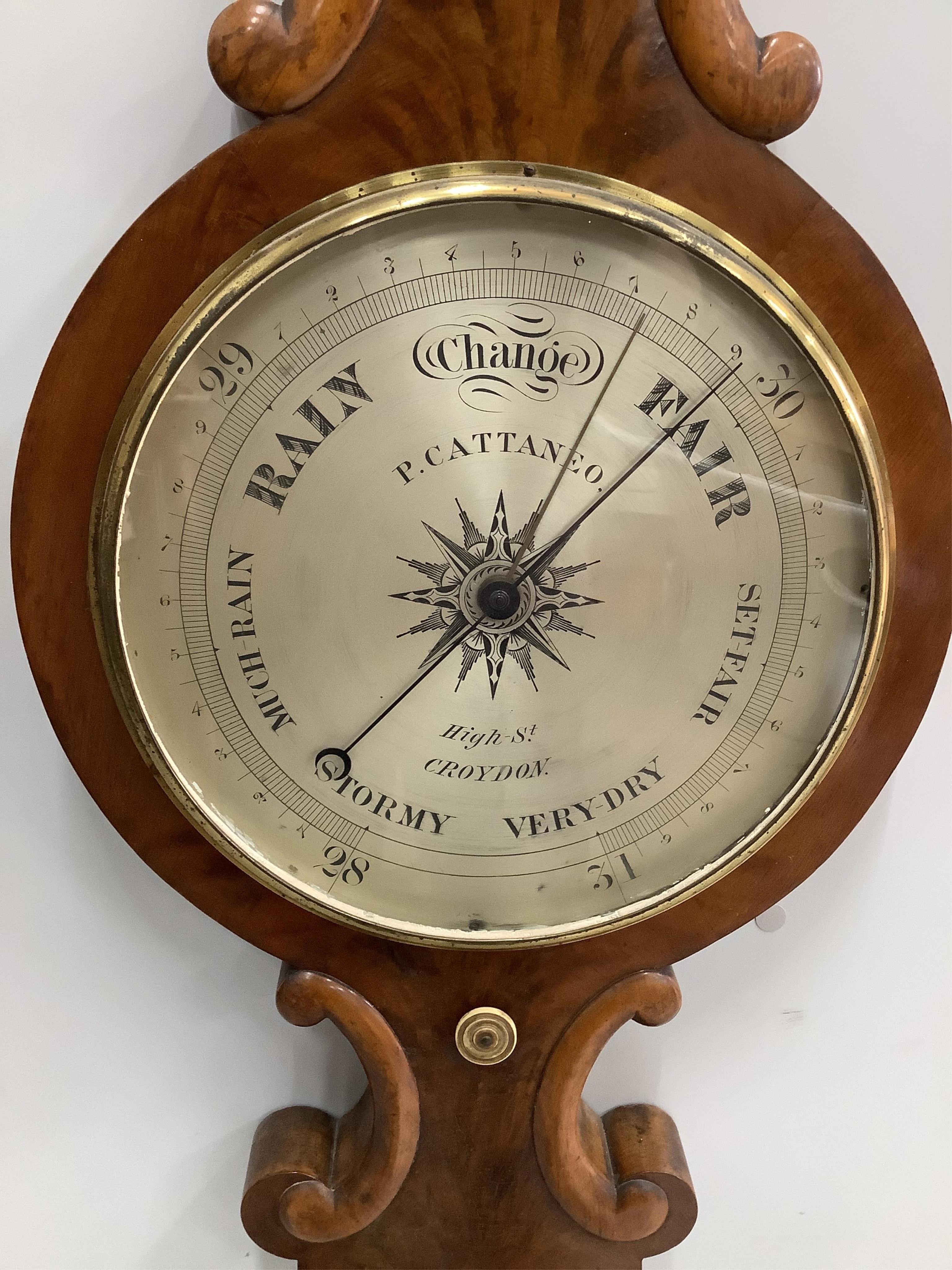 P. Cattaneo, High Street, Croydon. An early Victorian flamed mahogany wheel barometer, height 114cm. Condition - fair to good